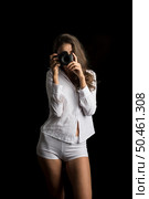 Fashion Portrait of young Woman photographer with camera. Стоковое фото, агентство Ingram Publishing / Фотобанк Лори