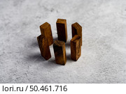 Wooden blocks, used for domino games, Arranged in a circle. Стоковое фото, агентство Ingram Publishing / Фотобанк Лори