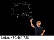 The boy pretends to be a superhero and uses a megaphone to amplify the sound. Draw concept. Стоковое фото, агентство Ingram Publishing / Фотобанк Лори