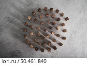 Wooden blocks, used for domino games, Arranged in a circle. Стоковое фото, агентство Ingram Publishing / Фотобанк Лори