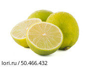 Fresh green limes isolated on white background. Стоковое фото, агентство Ingram Publishing / Фотобанк Лори