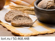 Bread rye spikelets on an old wooden background. Стоковое фото, агентство Ingram Publishing / Фотобанк Лори