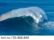 A huge wave breaking in Nazare, Portugal. Стоковое фото, агентство Ingram Publishing / Фотобанк Лори