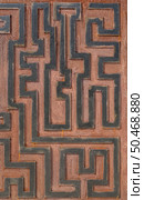 Metal rusty background, with geometrical shapes forming a labyrinth. Стоковое фото, агентство Ingram Publishing / Фотобанк Лори