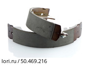 Car brake pads on white reflective background. Стоковое фото, агентство Ingram Publishing / Фотобанк Лори