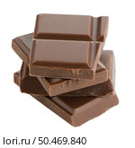 Closeup detail of chocolate parts on white background. Стоковое фото, агентство Ingram Publishing / Фотобанк Лори