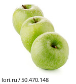 Three fresh green apples on white background. Стоковое фото, агентство Ingram Publishing / Фотобанк Лори