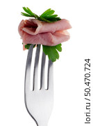 Slice of ham skewered on a fork isolated on white background. Стоковое фото, агентство Ingram Publishing / Фотобанк Лори