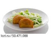 Rissole - pork meat and cheese rissole served with salad. Стоковое фото, агентство Ingram Publishing / Фотобанк Лори