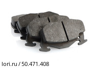 Car brake pads on white reflective background. Стоковое фото, агентство Ingram Publishing / Фотобанк Лори