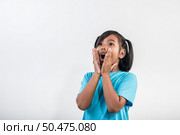 little girl acting Shout in studio shot. Стоковое фото, агентство Ingram Publishing / Фотобанк Лори