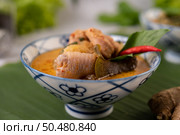 Chicken curry with Wax gourd in a ceramic cup, Selective focus. Стоковое фото, агентство Ingram Publishing / Фотобанк Лори
