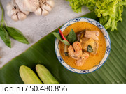 Chicken curry with Wax gourd in a ceramic cup, Selective focus. Стоковое фото, агентство Ingram Publishing / Фотобанк Лори