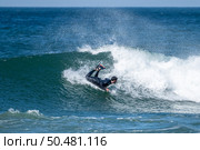 Bodyboarder surfing ocean wave on a sunny winter day. Стоковое фото, агентство Ingram Publishing / Фотобанк Лори