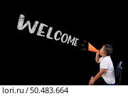 The boy shouted loudly Welcome. Стоковое фото, агентство Ingram Publishing / Фотобанк Лори