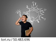The boy is confused, not knowing where to go. Стоковое фото, агентство Ingram Publishing / Фотобанк Лори