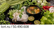 Rice noodles and coconut milk mixed with chilies, bitter melon, lentils, lemons, garlic and eggplant. Стоковое фото, агентство Ingram Publishing / Фотобанк Лори
