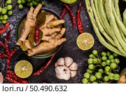 Rice noodle and Chicken feet liquid with Bitter Melon, long beans, lime, Garlic, Eggplant and Chili. Стоковое фото, агентство Ingram Publishing / Фотобанк Лори