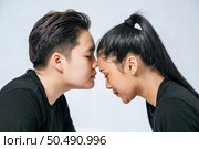 Women couples stand and fragrant cheek. Стоковое фото, агентство Ingram Publishing / Фотобанк Лори