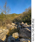 Water stream near Fecha de Barjas waterfall (also known as Tahiti waterfall) in the mountains of Peneda-Geres National Park, Portugal. Стоковое фото, агентство Ingram Publishing / Фотобанк Лори