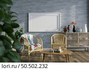 3D illustration mockup photo frame on the wall in living room, scandinavian style interior with rattan furniture and houseplant in natural decoration concept, rendering. Стоковое фото, агентство Ingram Publishing / Фотобанк Лори