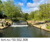 Waterfall on the Caster River in the City Park of Ovar. Стоковое фото, агентство Ingram Publishing / Фотобанк Лори