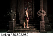 Portrait Handsome shirtless man in turban on head and beautiful silver ornament, The actor in Perform on legend love popular story, Thai Isan folktale called "Phadaeng and Nang-ai" in acient site. Стоковое фото, агентство Ingram Publishing / Фотобанк Лори