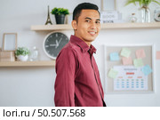 The male worker accomplished the task and smiled to the side. Стоковое фото, агентство Ingram Publishing / Фотобанк Лори