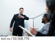 Businessperson and the generation personalities of new executives with good ideas, personality, and vision as well as giving importance to time. Стоковое фото, агентство Ingram Publishing / Фотобанк Лори