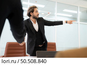Group of young businessmen in international companies, Meeting to conclude a new responsible project. Стоковое фото, агентство Ingram Publishing / Фотобанк Лори