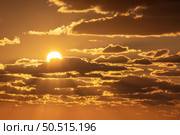 Big Sun on sunset. Nature composition. Стоковое фото, агентство Ingram Publishing / Фотобанк Лори