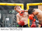 Muay Thai, The martial art of Thailand, Power punches into the face of the opponent. Able to defeat opponent by knockout. Стоковое фото, агентство Ingram Publishing / Фотобанк Лори