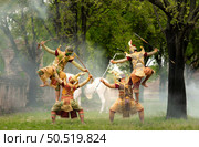 Khon, Is a classical Thai dance masked in Ramayana literature and this is a group of giant characters from the Tosakan side. Стоковое фото, агентство Ingram Publishing / Фотобанк Лори