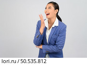 Portrait young beautiful woman in formal clothing for officer standing laugh and exciting, isolated on white background,  copy space for insert your advertisement. Стоковое фото, агентство Ingram Publishing / Фотобанк Лори