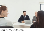 Executives interviewing new employees who will be responsible for the new business that is about to be launched. Стоковое фото, агентство Ingram Publishing / Фотобанк Лори