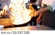 Chefs that specialize in cooking will be meticulous with every cooking process. Even minor details will not be overlooked. As with stir-fry, high heat will be used until a flaming flame appears. Стоковое фото, агентство Ingram Publishing / Фотобанк Лори
