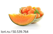 Juicy honeydew melon on a white background. Стоковое фото, агентство Ingram Publishing / Фотобанк Лори