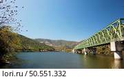 Douro valley view near the Ferradosa bridge at Sao Xisto Located in Vale de Figueira, Sao Joao da Pesqueira Municipality, the village is dominated by a breathtaking landscape. Стоковое фото, агентство Ingram Publishing / Фотобанк Лори
