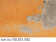 Old orange wall texture in Pisa, Italy. Old orange wall. Стоковое фото, агентство Ingram Publishing / Фотобанк Лори