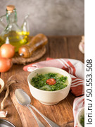 Caldo verde popular soup in Portuguese cuisine. traditional ingredients for caldo verde are potatoes, collard greens , olive oil and salt. Additionally garlic or onion may be added. Стоковое фото, агентство Ingram Publishing / Фотобанк Лори