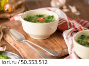 Caldo verde popular soup in Portuguese cuisine. traditional ingredients for caldo verde are potatoes, collard greens , olive oil and salt. Additionally garlic or onion may be added. Стоковое фото, агентство Ingram Publishing / Фотобанк Лори