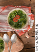 Caldo verde popular soup in Portuguese cuisine. traditional ingredients for caldo verde are potatoes, collard greens , olive oil and salt. Additionally garlic or onion may be added. Стоковое фото, агентство Ingram Publishing / Фотобанк Лори