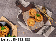Pastries filled with meat, traditionally baked in black clay molds both from the region on Vila Real, Portugal. Стоковое фото, агентство Ingram Publishing / Фотобанк Лори
