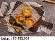 Pastries filled with meat, traditionally baked in black clay molds both from the region on Vila Real, Portugal. Стоковое фото, агентство Ingram Publishing / Фотобанк Лори