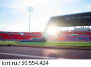 Athletes with disabilities take a break at the stadium between training sessions. Стоковое фото, агентство Ingram Publishing / Фотобанк Лори