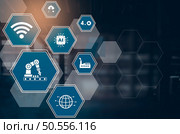 Industry 4.0 technology concept - Smart factory for fourth industrial revolution with icon graphic showing automation system by using robots and automated machinery controlled via internet network . Стоковое фото, агентство Ingram Publishing / Фотобанк Лори