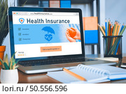 Health insurance web site modish registration system for easy form filling concept. Стоковое фото, агентство Ingram Publishing / Фотобанк Лори