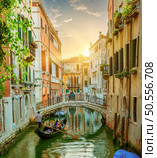 Gondola and old houses in Venice, Italy. Стоковое фото, агентство Ingram Publishing / Фотобанк Лори