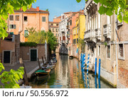 Boats in Venice on the Grand Canal, Italy. Canal in the sunshine. Стоковое фото, агентство Ingram Publishing / Фотобанк Лори