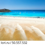 Aerial view of beautiful beach with white sand, umbrellas, yachts, boats in blue sea, mountains in summer sanny day. Top drone view of sea spit, clear azure water, sandy beach. Sardinia island, Italy. Стоковое фото, агентство Ingram Publishing / Фотобанк Лори